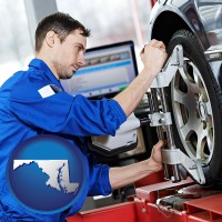 md map icon and a mechanic adjusting a wheel alignment machine clamp