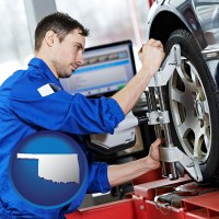 ok map icon and a mechanic adjusting a wheel alignment machine clamp