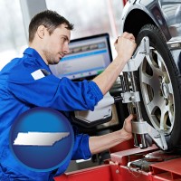tn map icon and a mechanic adjusting a wheel alignment machine clamp