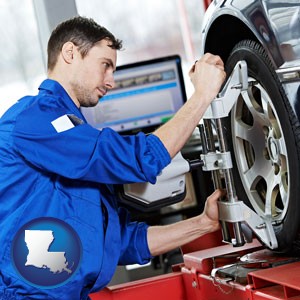 a mechanic adjusting a wheel alignment machine clamp - with Louisiana icon