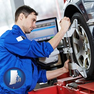 a mechanic adjusting a wheel alignment machine clamp - with Rhode Island icon